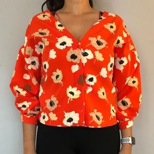 Bright orange-red floral print blouse from Zara